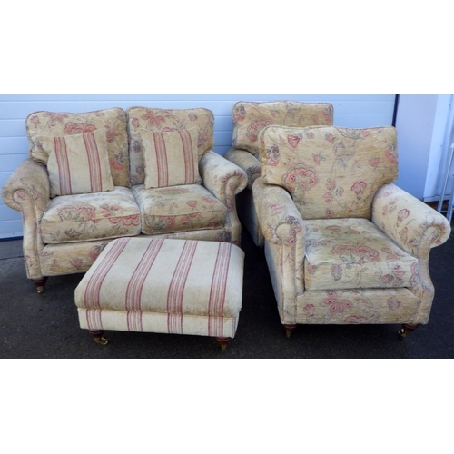 776 - A three piece suite with footstool (4)