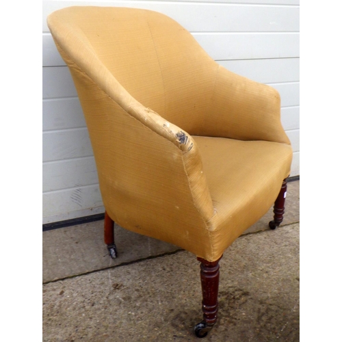 781 - A 19th cen upholstered tub chair on turned mahogany legs