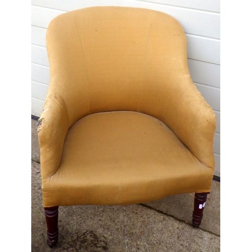 781 - A 19th cen upholstered tub chair on turned mahogany legs