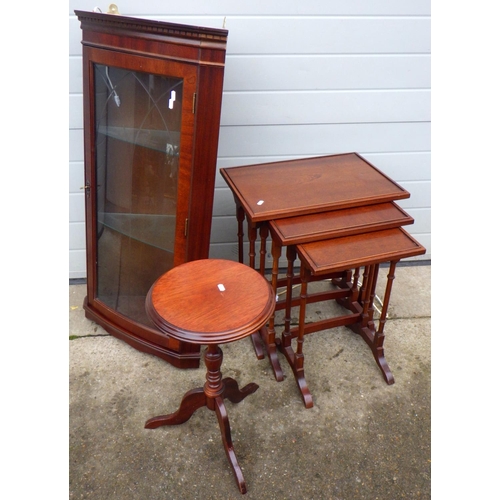 812 - A nest of three reproduction mahogany occasional tables together with a corner cabinet and a wine ta... 