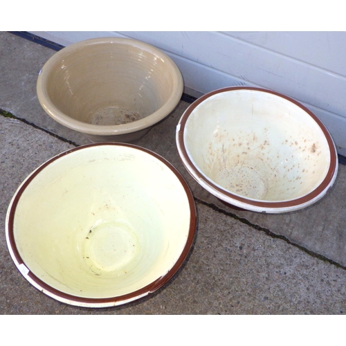 833 - Three mixing bowl pancheons, approx 41cm across, a/f