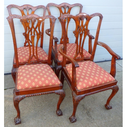 834 - A set of four reproduction Chippendale style dining chairs incl two carvers