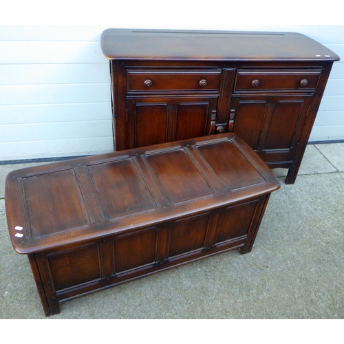 836 - A dark Ercol dresser base, 124cm wide together with a four panel blanket box (2)