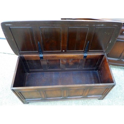 836 - A dark Ercol dresser base, 124cm wide together with a four panel blanket box (2)