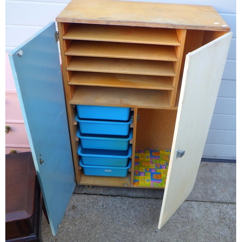 840 - A school cupboard, chest of drawers, Stag bedside table, missing handle and a pink painted chest of ... 