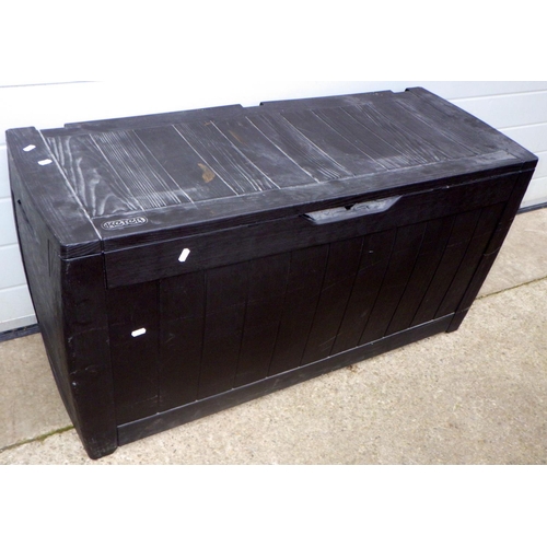 853 - A Keter, black plastic garden storage box, 116cm long