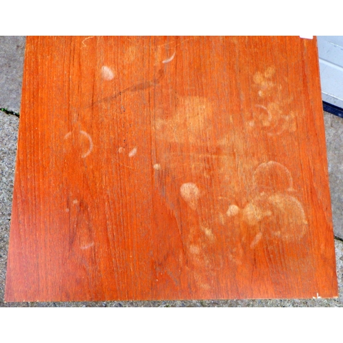 869 - A teak coffee table, marks, 51cm across