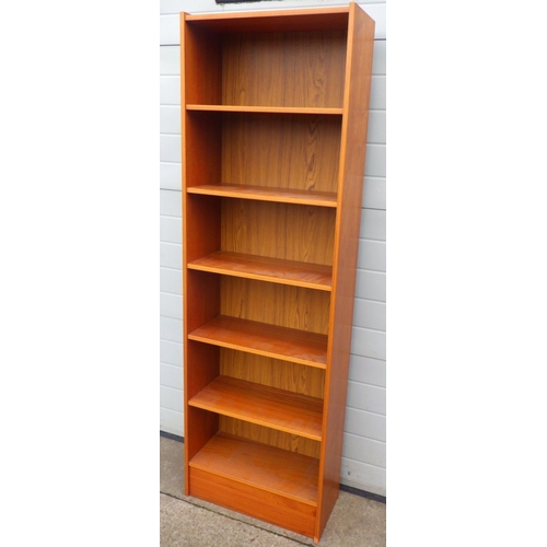 873 - A set of tall open bookshelves