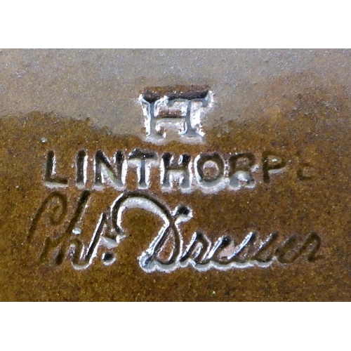 11 - A signed C Dresser Linthorpe Pottery plate 27cm diameter af