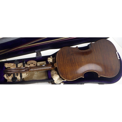 20 - A cased violin and two bows