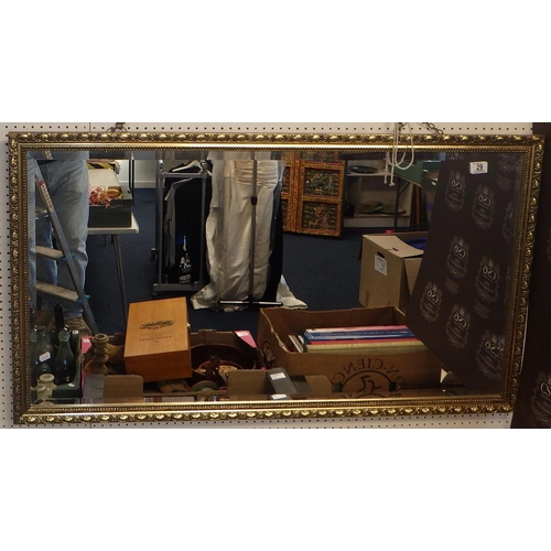 29 - Two large gilt framed bevelled mirrors together with two further smaller (4)