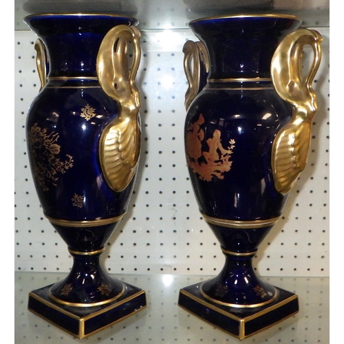 101 - A pair of gilded blue Limoges urns together with a matching swan handle vase (3)