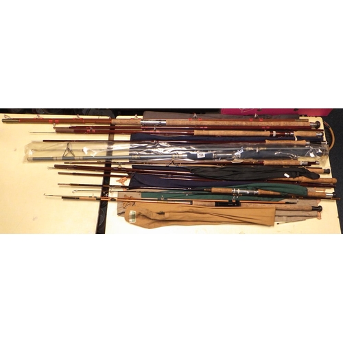 108 - A group of nine various fishing rods together with a box of misc reels, hooks etc