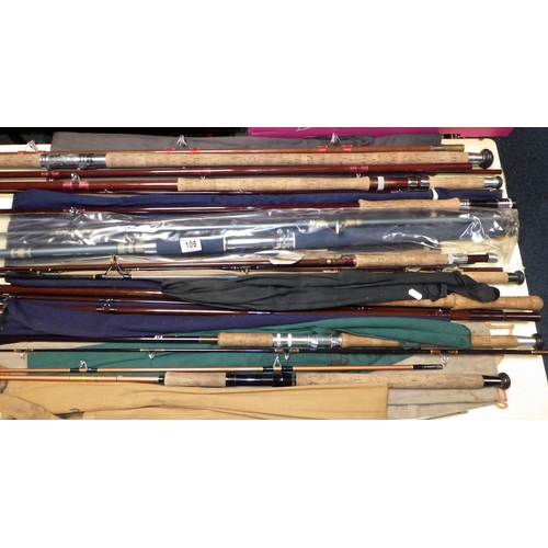 108 - A group of nine various fishing rods together with a box of misc reels, hooks etc