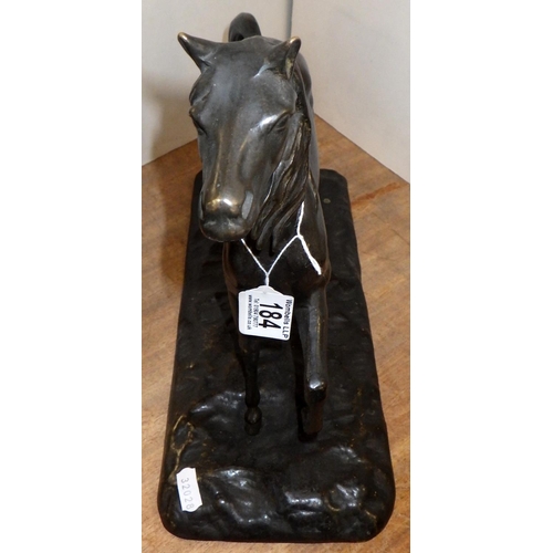 184 - A cast bronze figure of a horse 28cm high