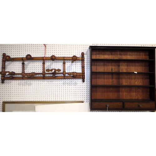 197 - An oak two drawer wall shelf together with a bamboo coat rack (2)