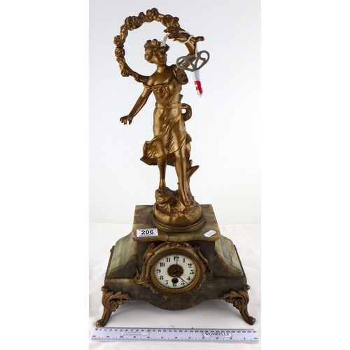 206 - A large light green onyx mantle clock with a mounted spelter figure 56cm tall AF