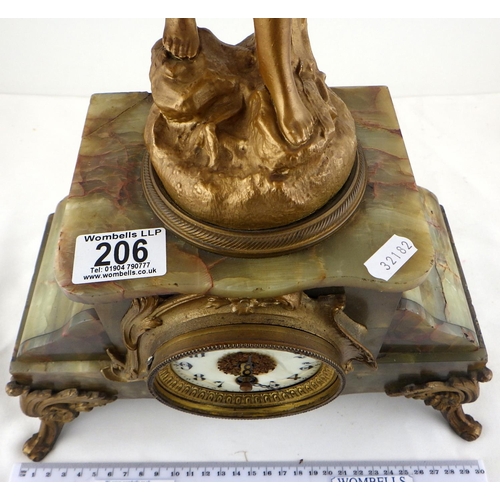 206 - A large light green onyx mantle clock with a mounted spelter figure 56cm tall AF