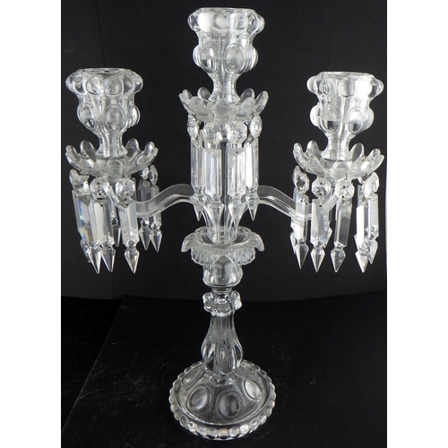 218 - A pair of pressed glass candelabras 46cm tall