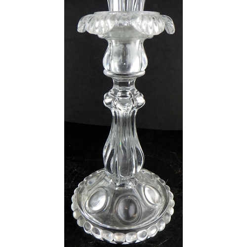 218 - A pair of pressed glass candelabras 46cm tall