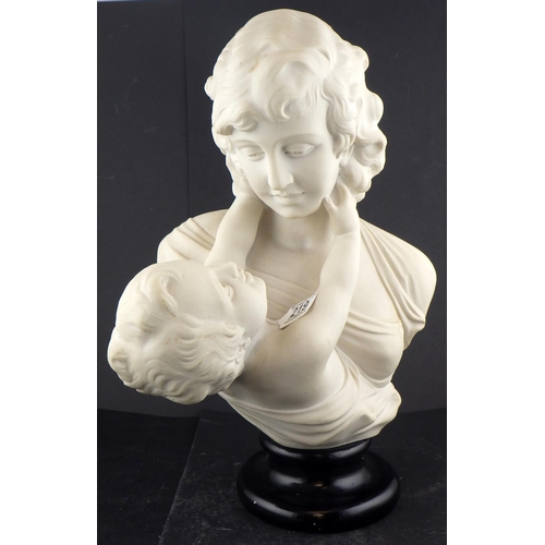 219 - A reconstituted marble bust of a mother and child 44cm tall