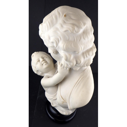 219 - A reconstituted marble bust of a mother and child 44cm tall