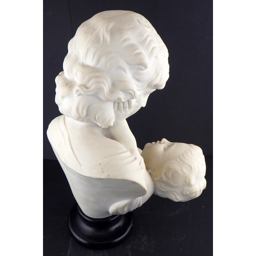 219 - A reconstituted marble bust of a mother and child 44cm tall