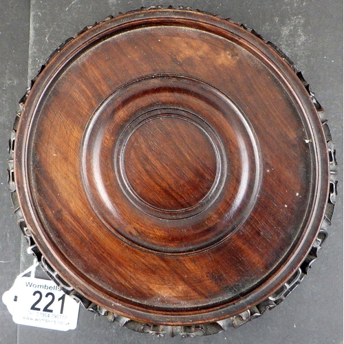 221 - An Oriental hardwood carved stand (14.5cm inner diameter)