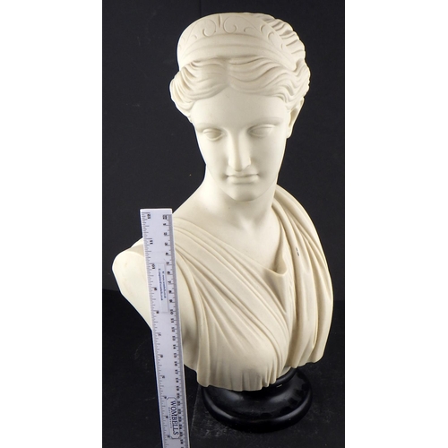 A reconstituted marble bust of Diana 48cm tall