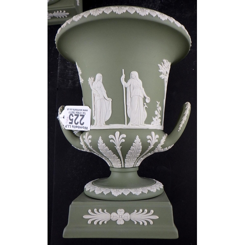 225 - A pair of Wedgwood Sage Green Jasperware twin-handled lidded urns 29cm tall