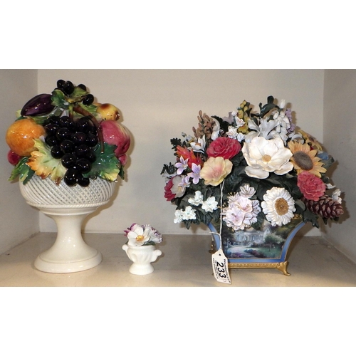 233 - A Bradford exchange floral bouquet together with an Italian pottery fruit bowl and a small floral po... 