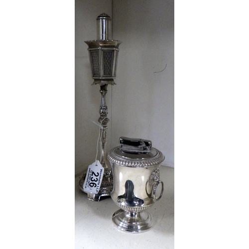 236 - A silver plated novelty street lamp table lighter 25cm tall together with a further lighter (2)