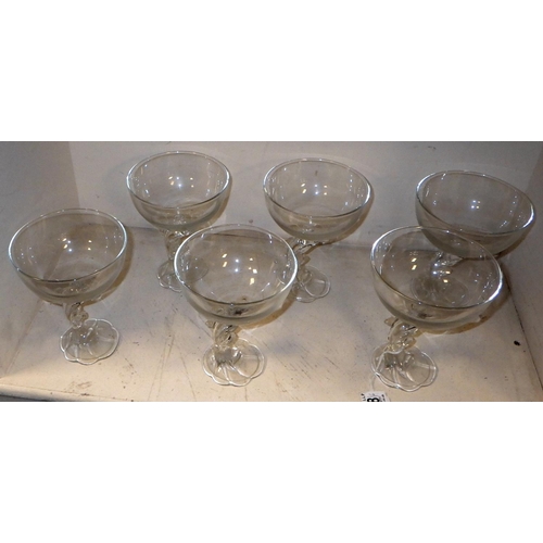 238 - A set of six dolphin stemmed desert bowls