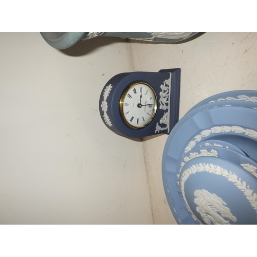 239 - A group of 7 pieces of blue Wedgwood Jasperware to inc a clock together with a Henley jardiniere AF ... 