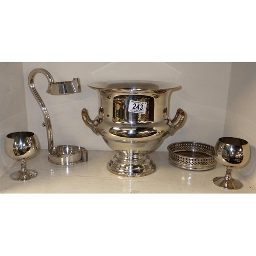 243 - A silver plated two handle urn together with a plated bottle coaster & bottle pourer and two goblets... 