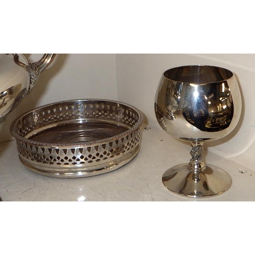 243 - A silver plated two handle urn together with a plated bottle coaster & bottle pourer and two goblets... 