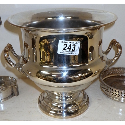 243 - A silver plated two handle urn together with a plated bottle coaster & bottle pourer and two goblets... 