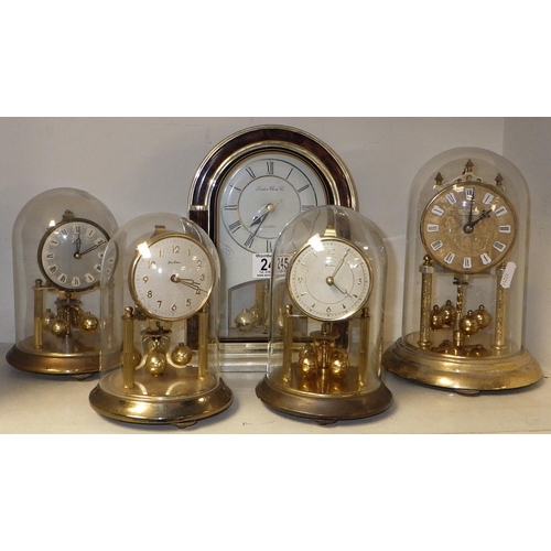 245 - A group of four domed anniversary clocks together with a London Clock Company mantle clock (5)