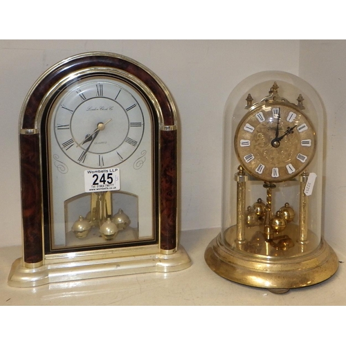 245 - A group of four domed anniversary clocks together with a London Clock Company mantle clock (5)