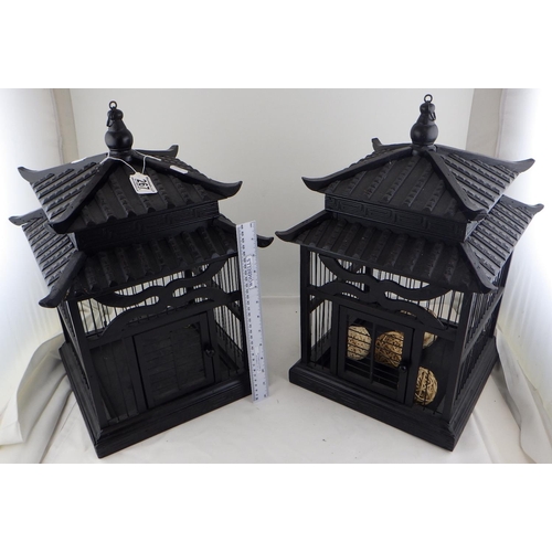 267 - Two Oriental bird cages