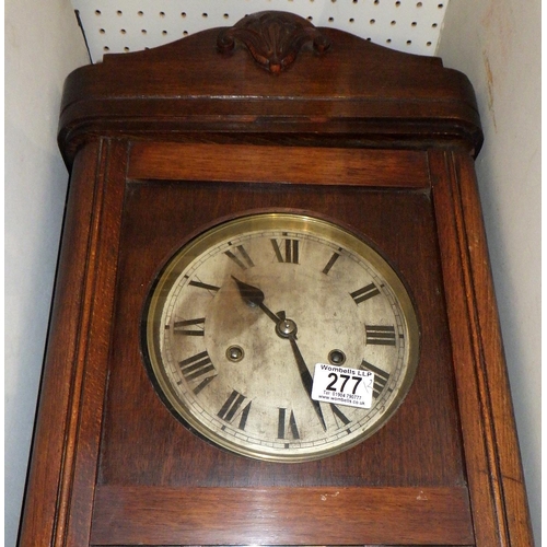 277 - Two wall clocks and a late Victorian aneroid carved oak barometer AF (3)