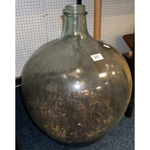 281 - A large glass carboy