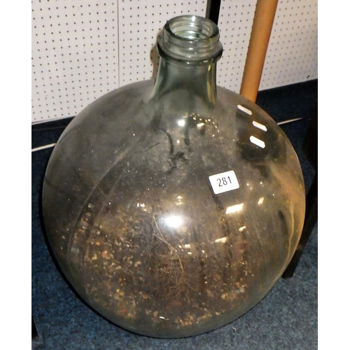 281 - A large glass carboy