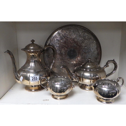 255 - A four piece silver plated tea set together with a circular tray (5)