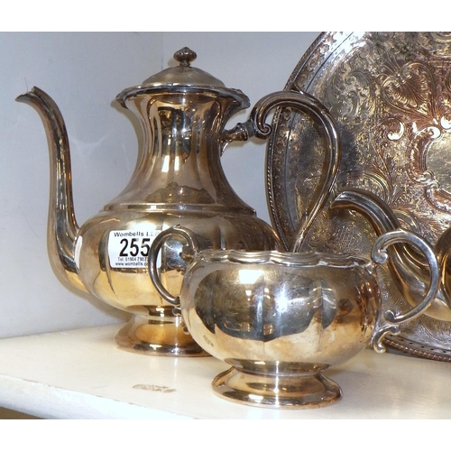 255 - A four piece silver plated tea set together with a circular tray (5)