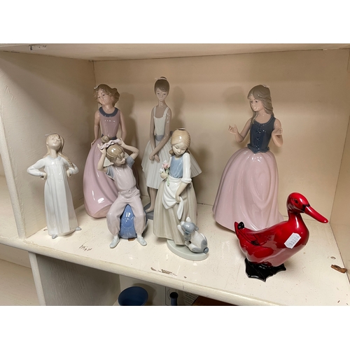 257 - A group of 6 NAO figures together with a Royal Doulton Flambé duck (7)