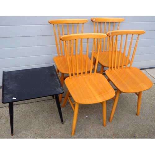 634 - A set of four blonde dining chairs together with a black occasional table (5)