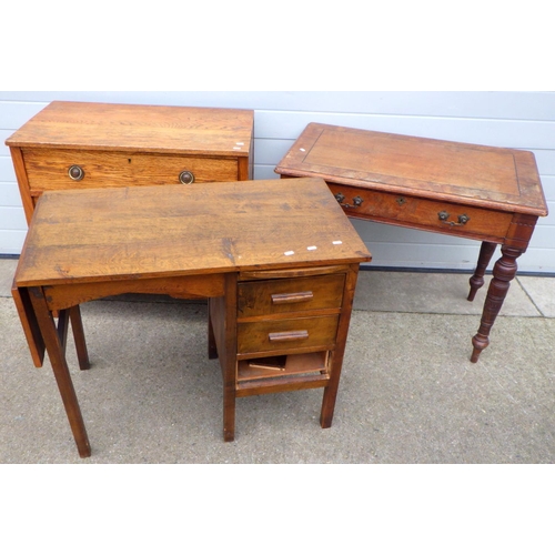 662 - A drop leaf oak desk, drawer front off, Victorian centre table and a chest of drawers (a/f) (3)