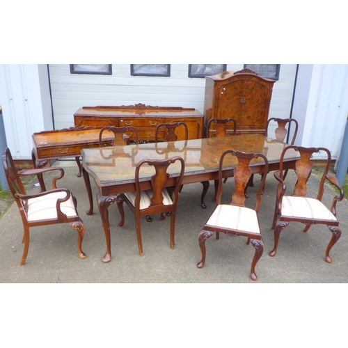 670 - A walnut dining suite, incl long table with glass top, 245cm long, eight chairs, veneer damage, side... 