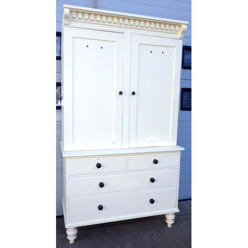 679 - A later painted Victorian cupboard on chest 140cm wide, 244cm tall